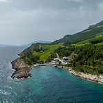 Beachfront Luxury Mare, Featuring A Heated Pool, Fitness Area, And Sauna