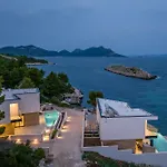 Beachfront Luxury Mare, Featuring A Heated Pool, Fitness Area, And Sauna Villa