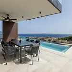 Beachfront Luxury Mare, Featuring A Heated Pool, Fitness Area, And Sauna Potomje