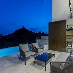 Beachfront Luxury Mare, Featuring A Heated Pool, Fitness Area, And Sauna