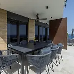 Beachfront Luxury Mare, Featuring A Heated Pool, Fitness Area, And Sauna Villa