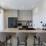 Beachfront Luxury Mare, Featuring A Heated Pool, Fitness Area, And Sauna