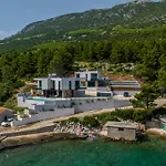 Beachfront Luxury Mare, Featuring A Heated Pool, Fitness Area, And Sauna *