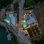 Beachfront Luxury Mare, Featuring A Heated Pool, Fitness Area, And Sauna Villa