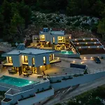Beachfront Luxury Mare, Featuring A Heated Pool, Fitness Area, And Sauna
