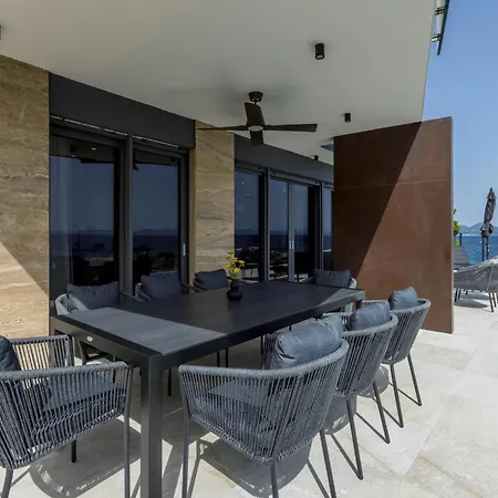 Beachfront Luxury Mare, Featuring A Heated Pool, Fitness Area, And Sauna Villa