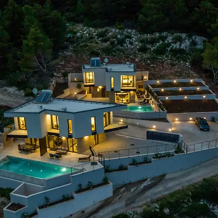 Beachfront Luxury Mare, Featuring A Heated Pool, Fitness Area, And Sauna