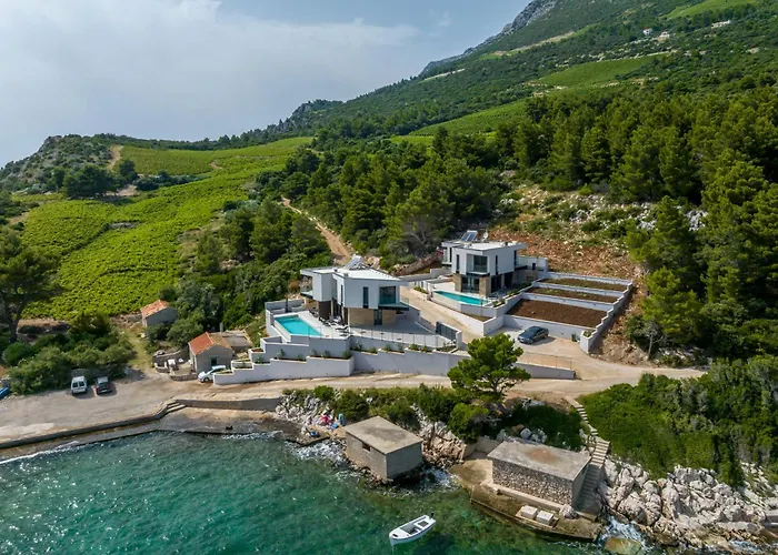 Beachfront Luxury Mare, Featuring A Heated Pool, Fitness Area, And Sauna