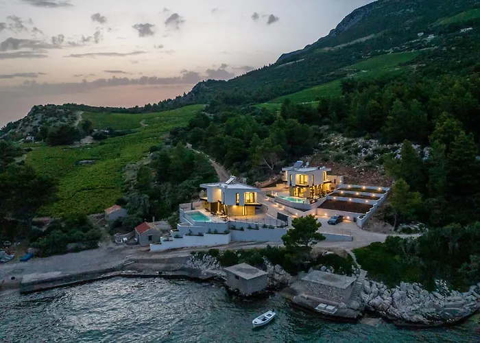 Willa Beachfront Luxury Mare, Featuring A Heated Pool, Fitness Area, And Sauna