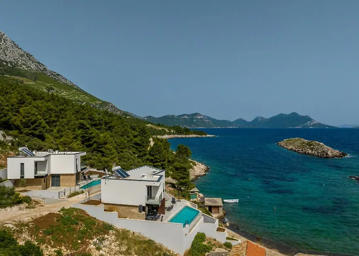 Beachfront Luxury Mare, Featuring A Heated Pool, Fitness Area, And Sauna Potomje