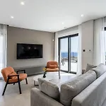 Beachfront Luxury Mare, Featuring A Heated Pool, Fitness Area, And Sauna