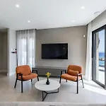 Beachfront Luxury Mare, Featuring A Heated Pool, Fitness Area, And Sauna