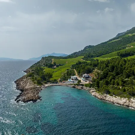 Beachfront Luxury Mare, Featuring A Heated Pool, Fitness Area, And Sauna