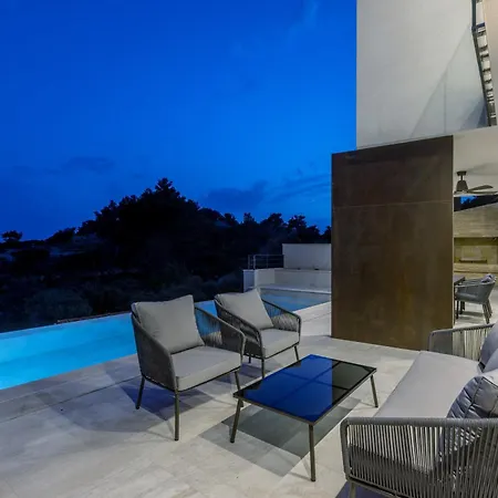 Beachfront Luxury Mare, Featuring A Heated Pool, Fitness Area, And Sauna