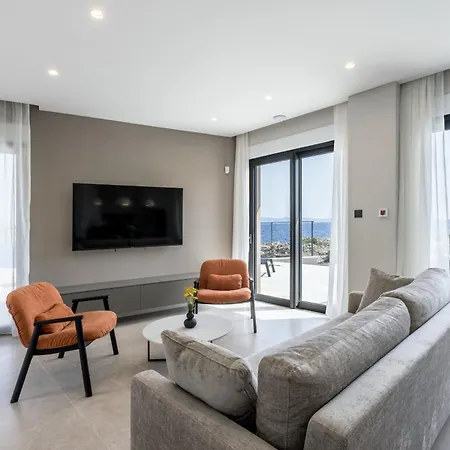 Beachfront Luxury Mare, Featuring A Heated Pool, Fitness Area, And Sauna