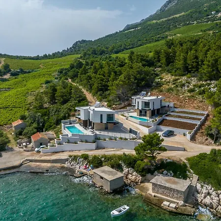 Beachfront Luxury Mare, Featuring A Heated Pool, Fitness Area, And Sauna