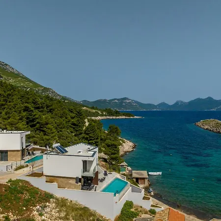 Beachfront Luxury Mare, Featuring A Heated Pool, Fitness Area, And Sauna Potomje