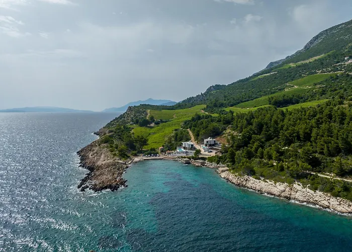 Beachfront Luxury Mare, Featuring A Heated Pool, Fitness Area, And Sauna