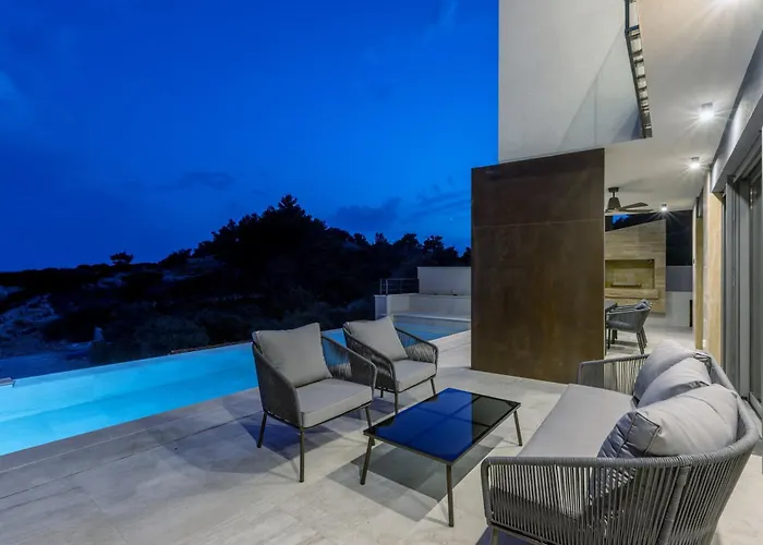 Beachfront Luxury Mare, Featuring A Heated Pool, Fitness Area, And Sauna