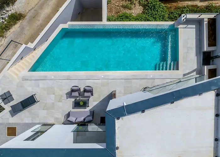 Beachfront Luxury Mare, Featuring A Heated Pool, Fitness Area, And Sauna