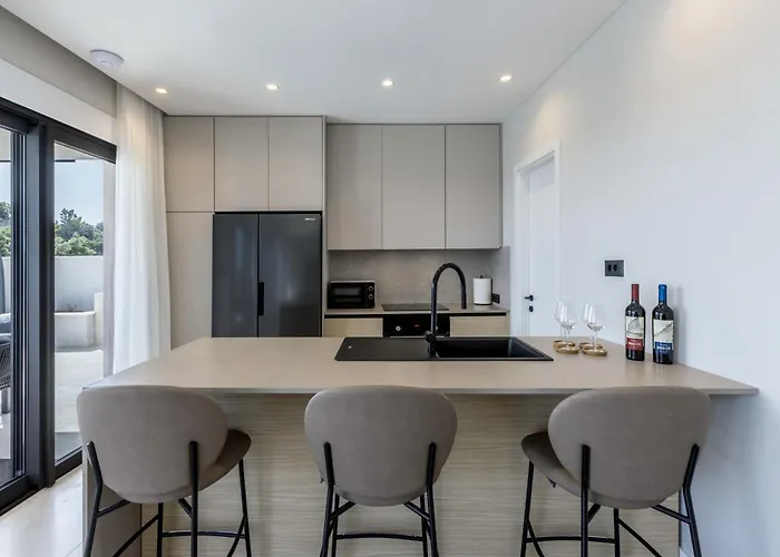 Beachfront Luxury Mare, Featuring A Heated Pool, Fitness Area, And Sauna